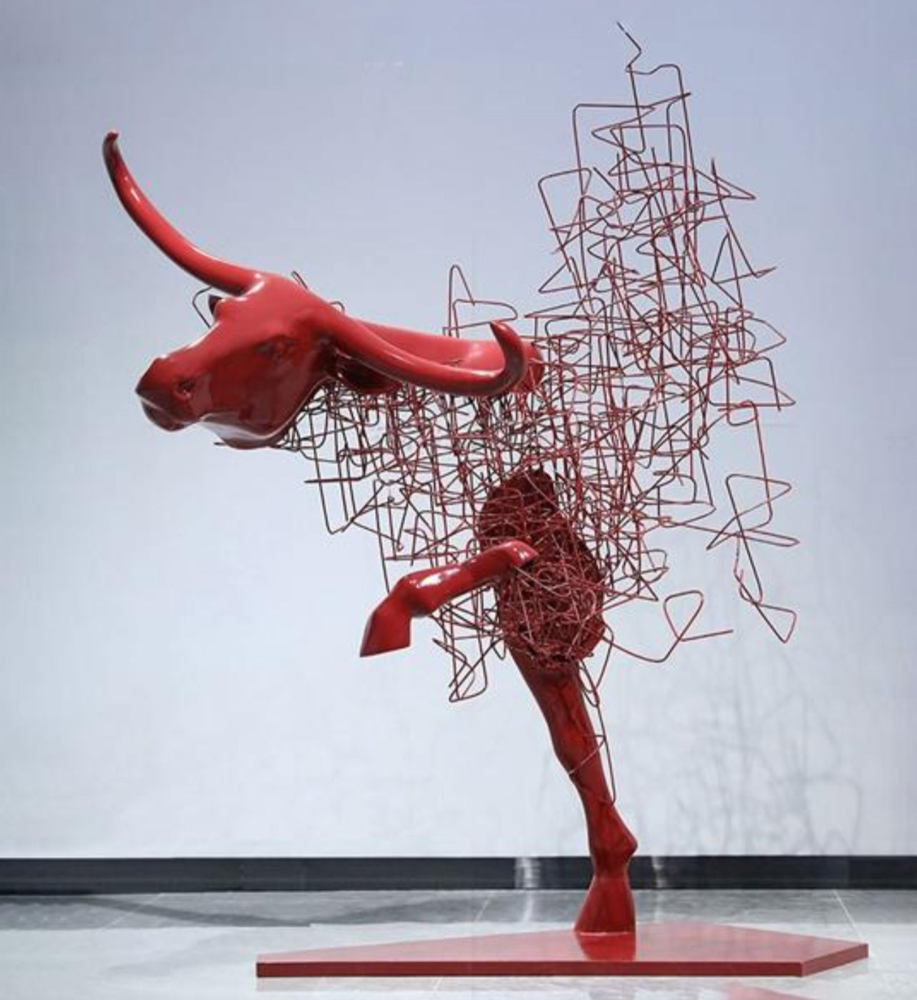 Red Charge – Abstract Bull Sculpture in Wire & Steel